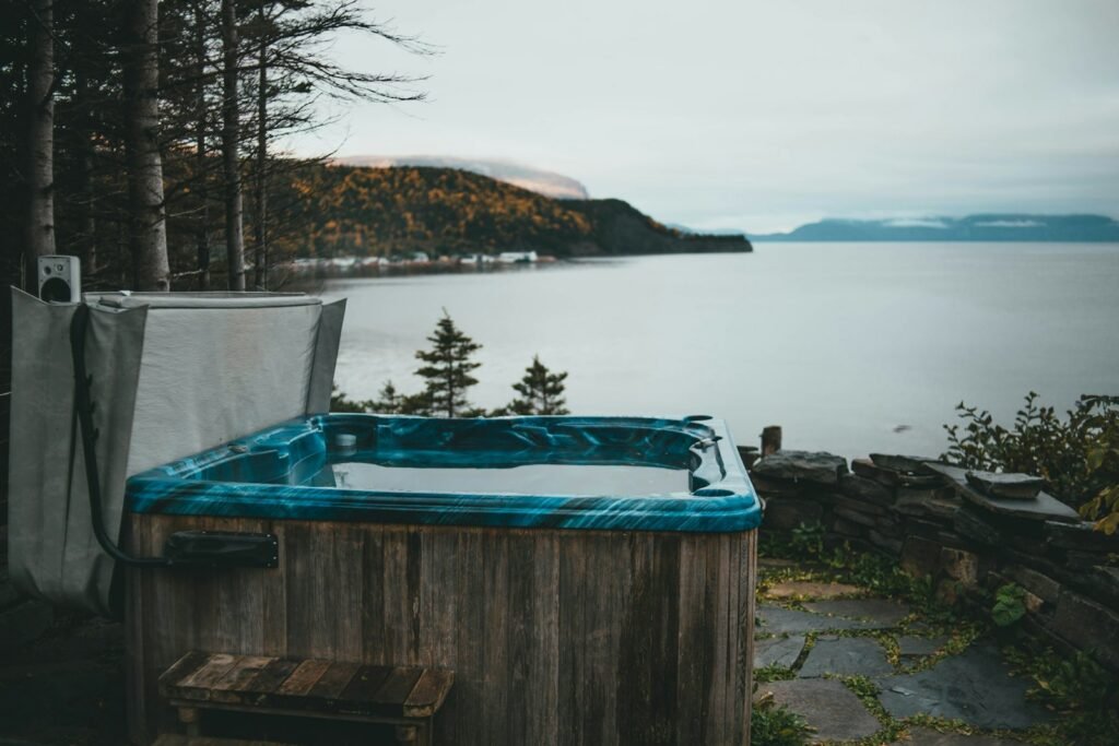 Outdoor acrylic hot tub with a sea view